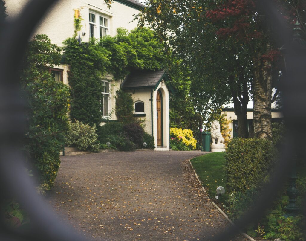 A home being inspected through the fence